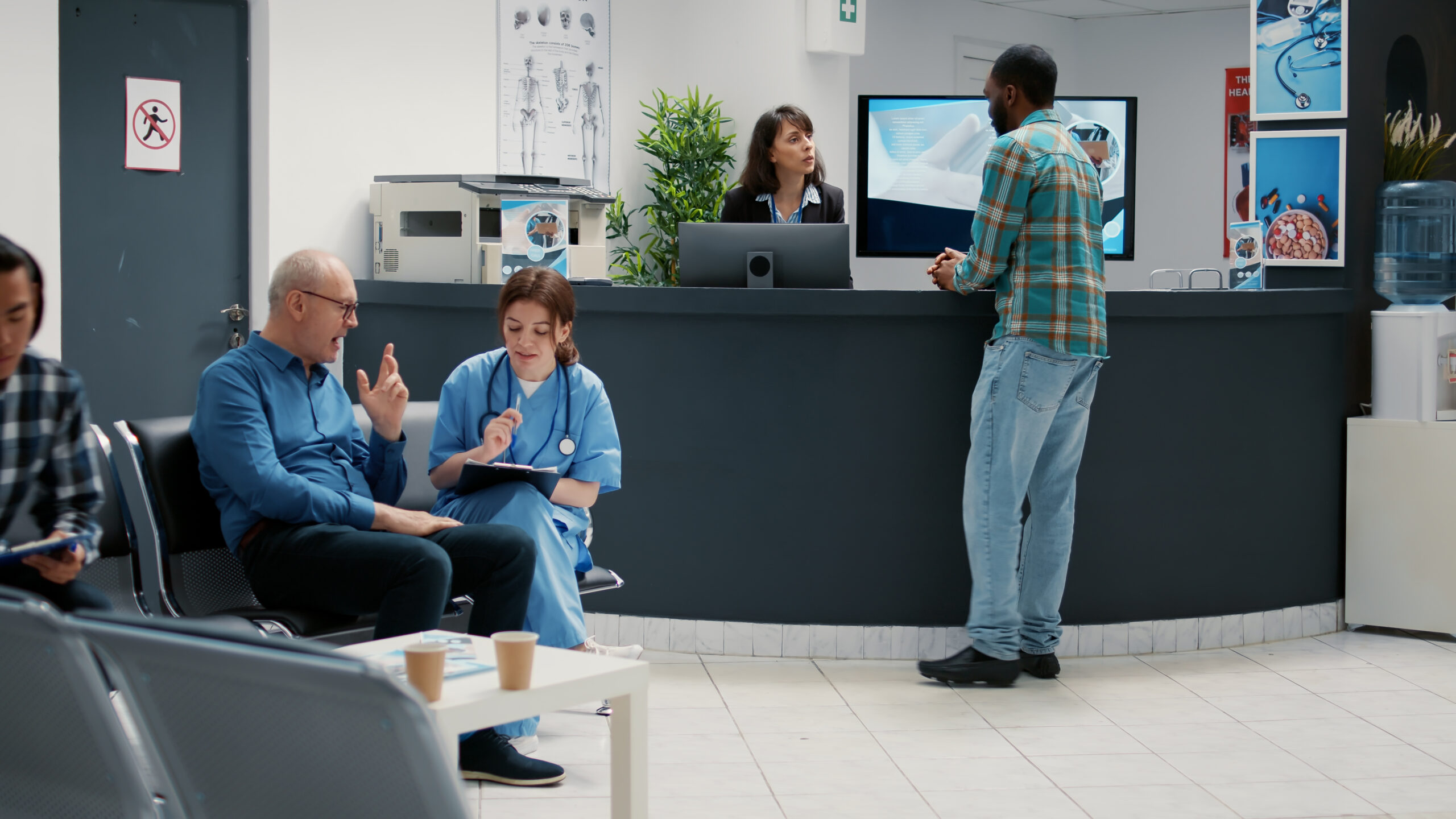 Reception desk with diverse patients waiting in lobby for checkup visit