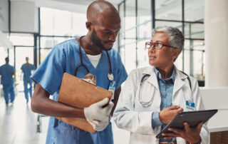 Doctors, nurse and teamwork on tablet for hospital management exploring Healthcare Industry Trends