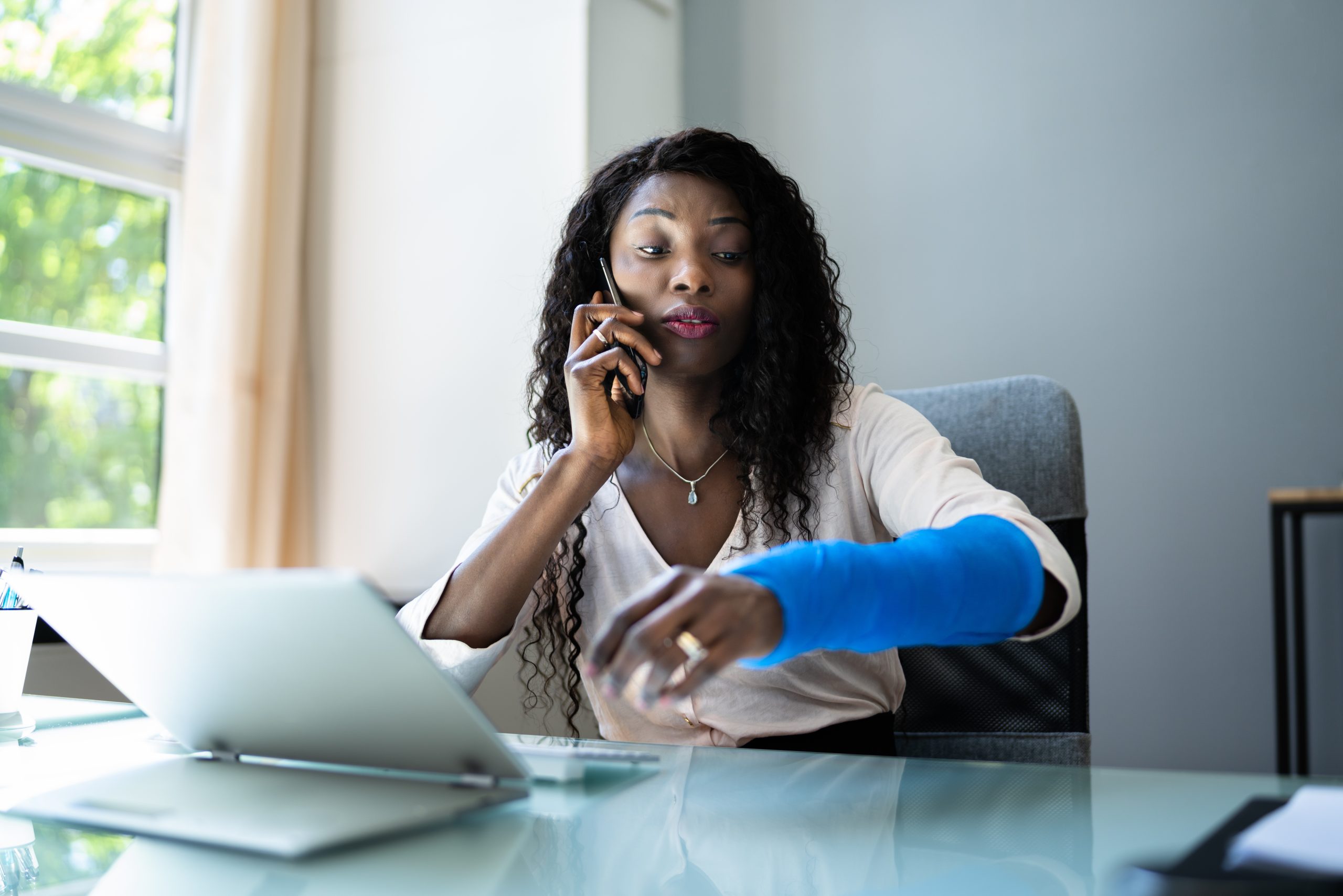 Broken Arm Injured Workers' Compensation Coverage. Using Office Laptop