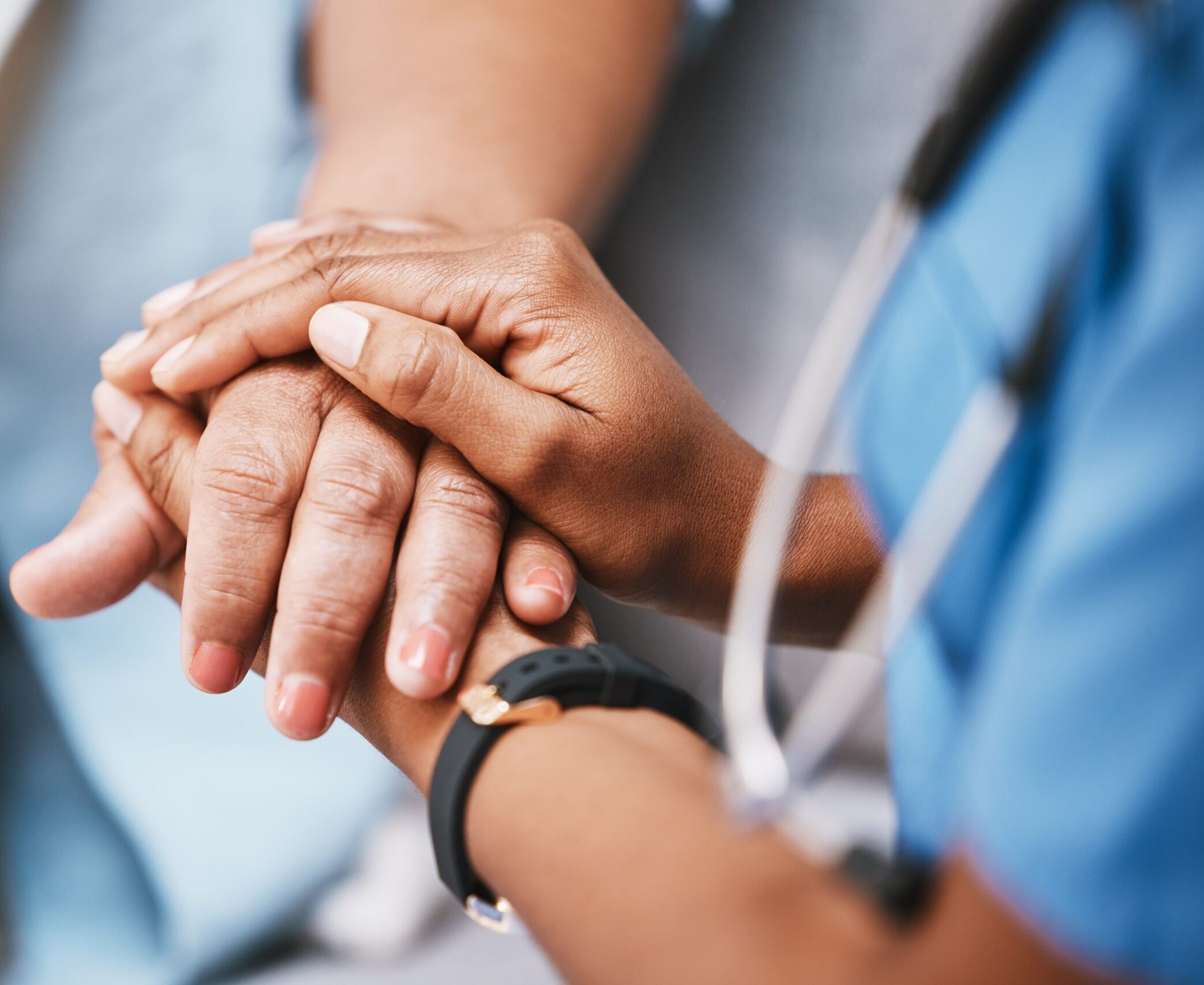 MPL insurance: Empathy, trust and nurse holding hands with patient for help