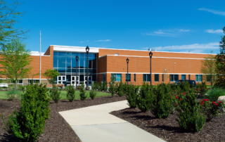 Scheduled vs. Blanket Property Coverage: pictured is a courtyard in front of a school.