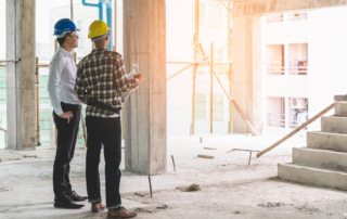 Stricter New Rules Limit Independent Contractor Hiring: A general contractor discussing a project with an independent contractor.