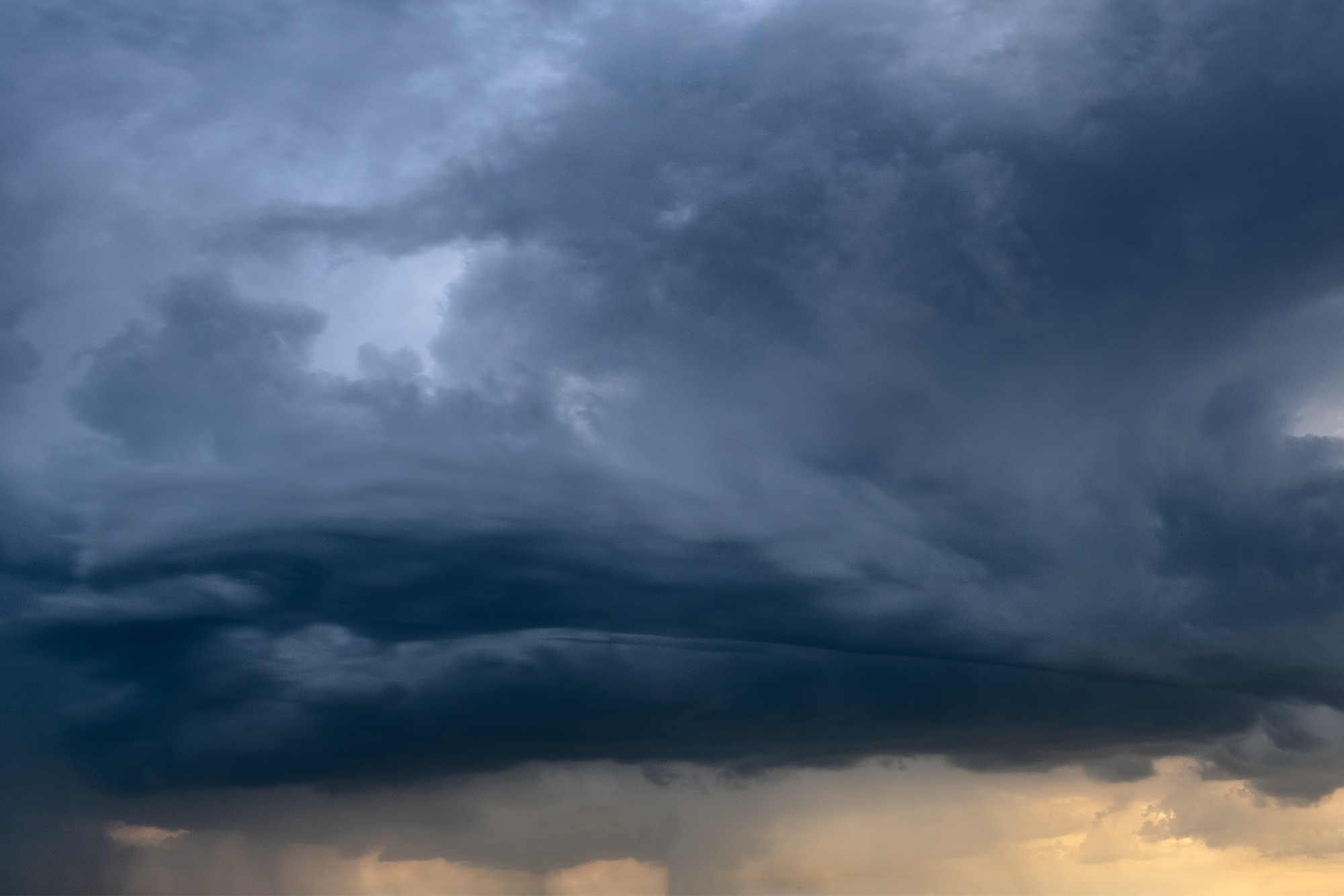 Navigating Spring's Big 3 Severe Weather Hazards: Floods, Hail, and Tornadoes: A storm cloud