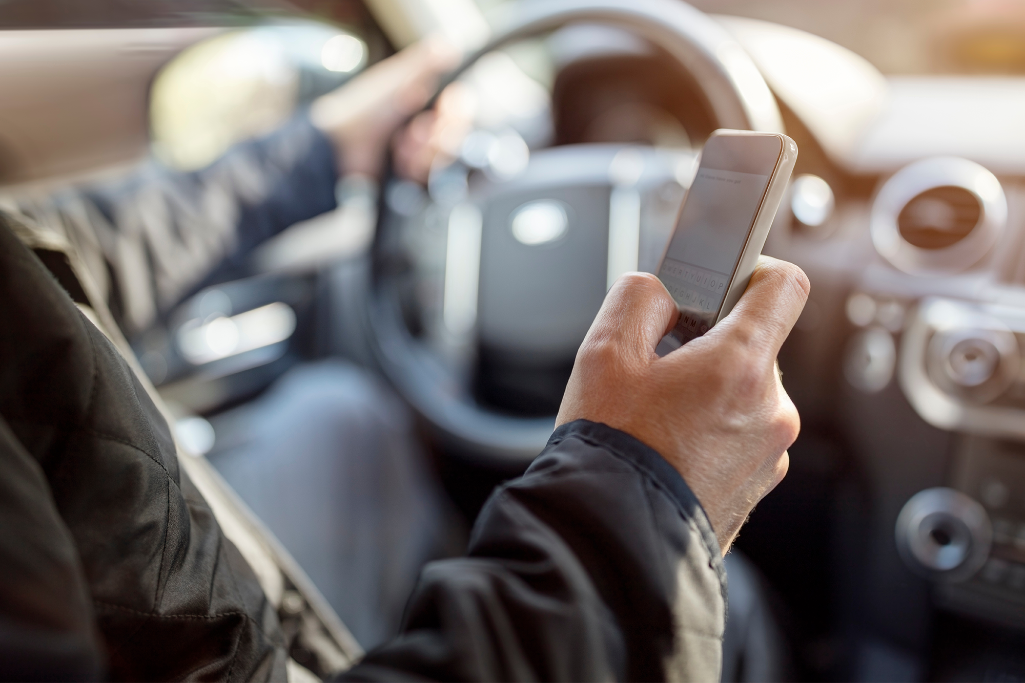 April’s National Distracted Driving Enforcement Campaign: A Distracted driver using their cell phone.