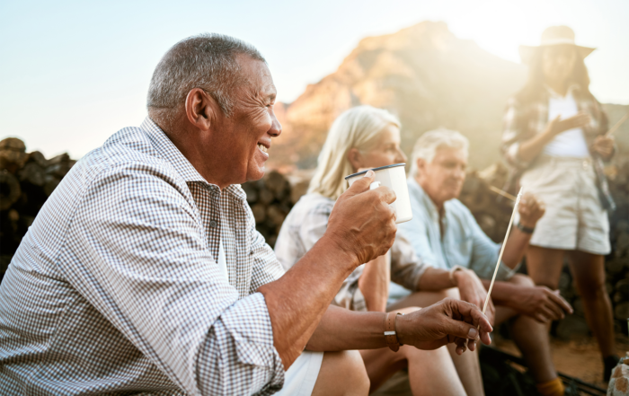 Maintaining Your Auto-401(k) Features: A group of retirement age people drinking coffee.