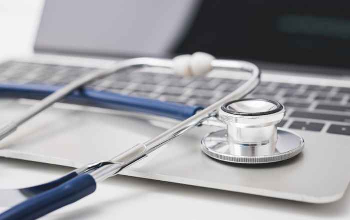 Cyber Case Study: Change Healthcare Cyberattack: a stethoscope sitting on a laptop.