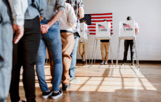 Polling Place Safety in Schools, People voting at a booth